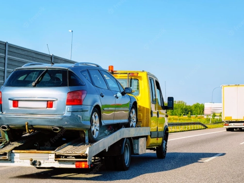 low-tow-truck-trailer-with-car-road-auto-vehicle-with-carrier-transporter-hauler-driveway-european-transport-logistics-haulage-work-transportation-haul-highway_250132-1286